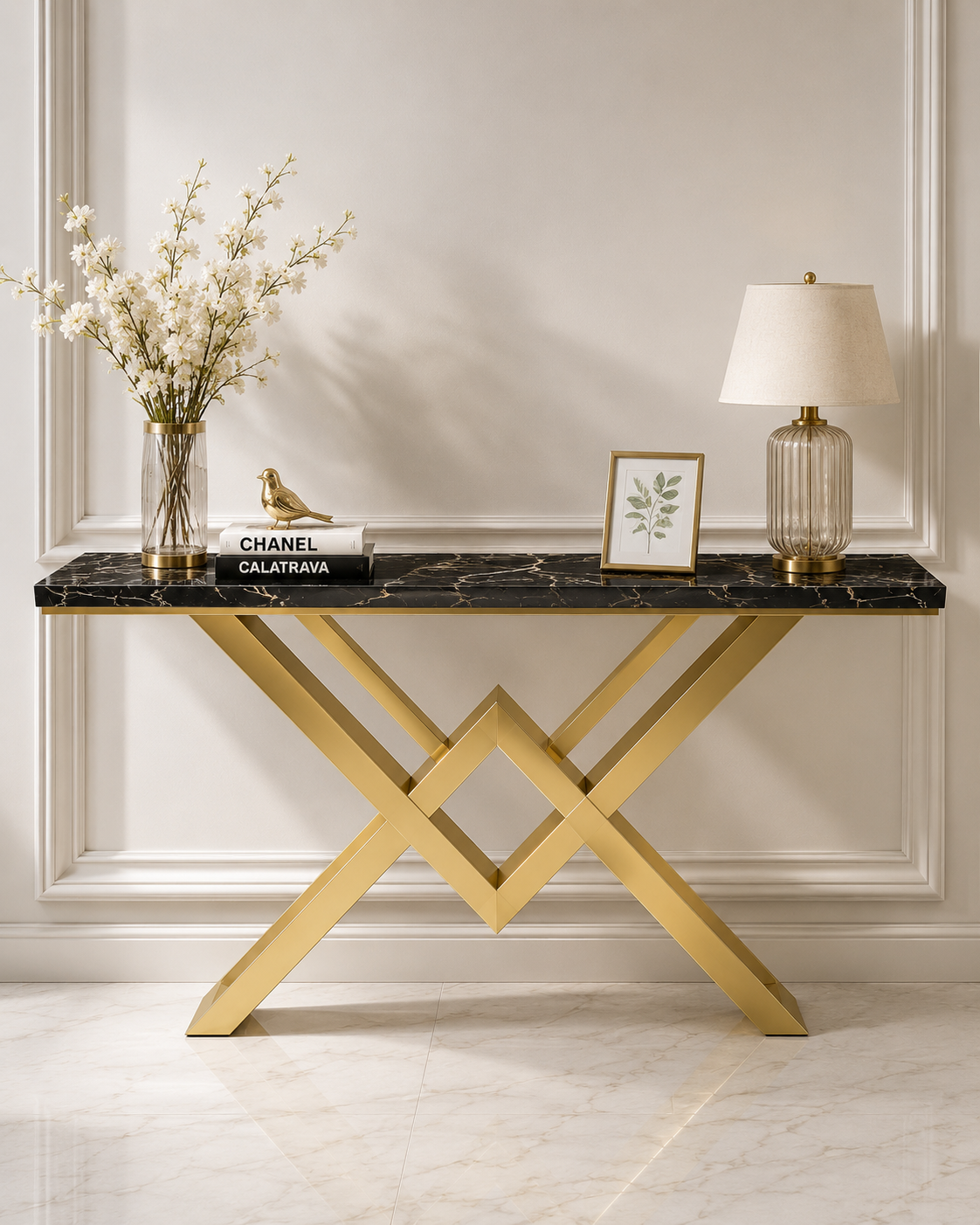 Modern luxury console table with black marble top and gold X-shape metal base for hallway and living room décor.
