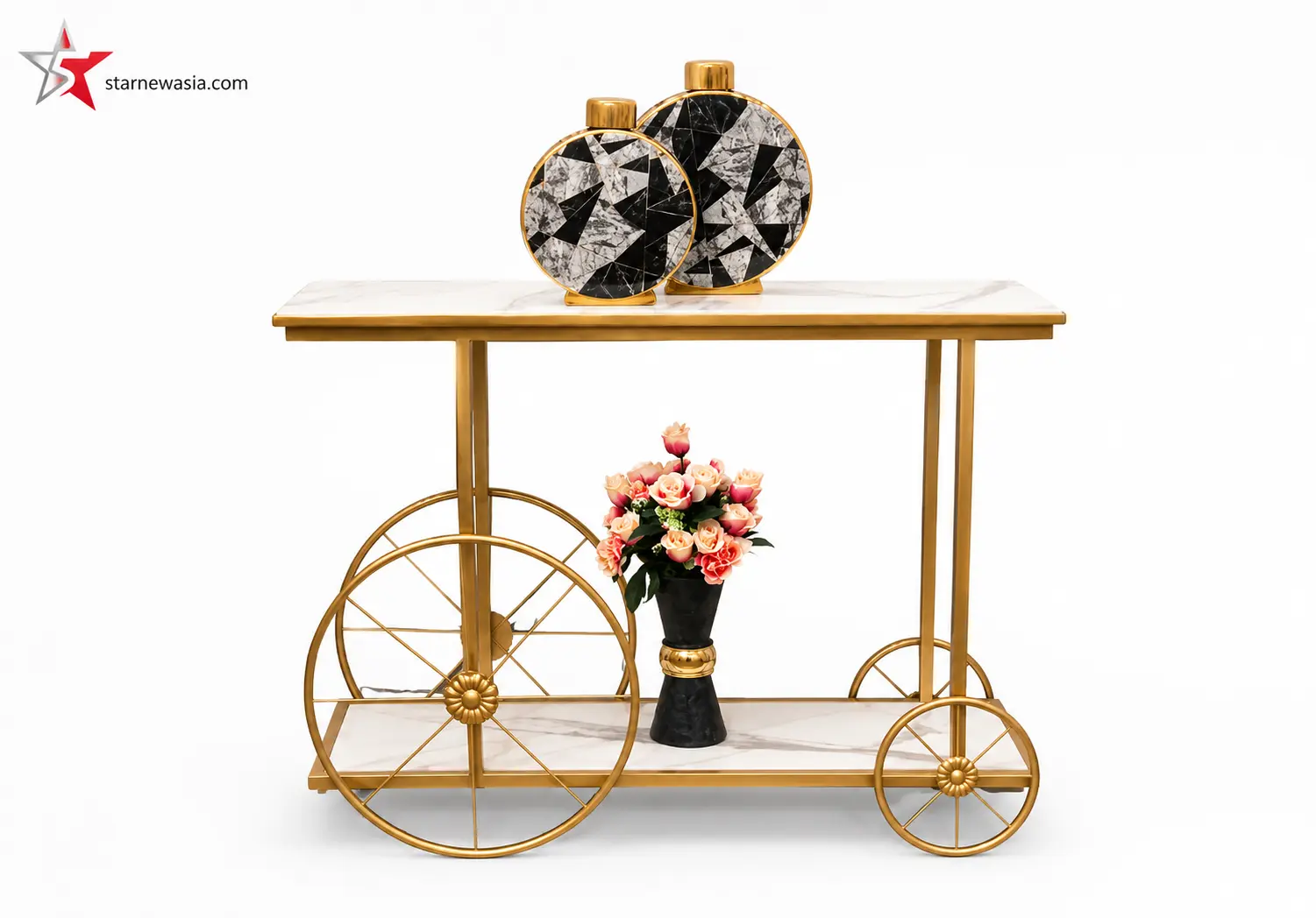 starnewasia.com watermark on a luxury gold serving cart with double white stone-patterned tiers and large decorative spoke wheels, styled with geometric vases and roses.